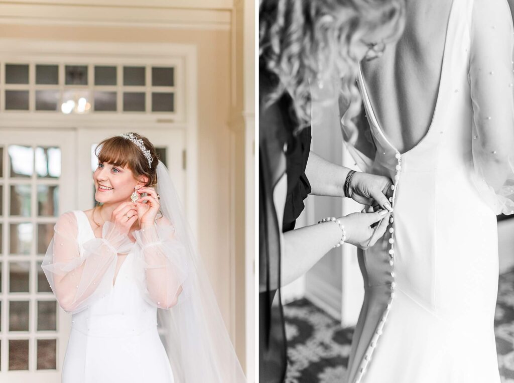 Bride putting on her earrings while smiling out the window and her mom buttoning up her wedding dress