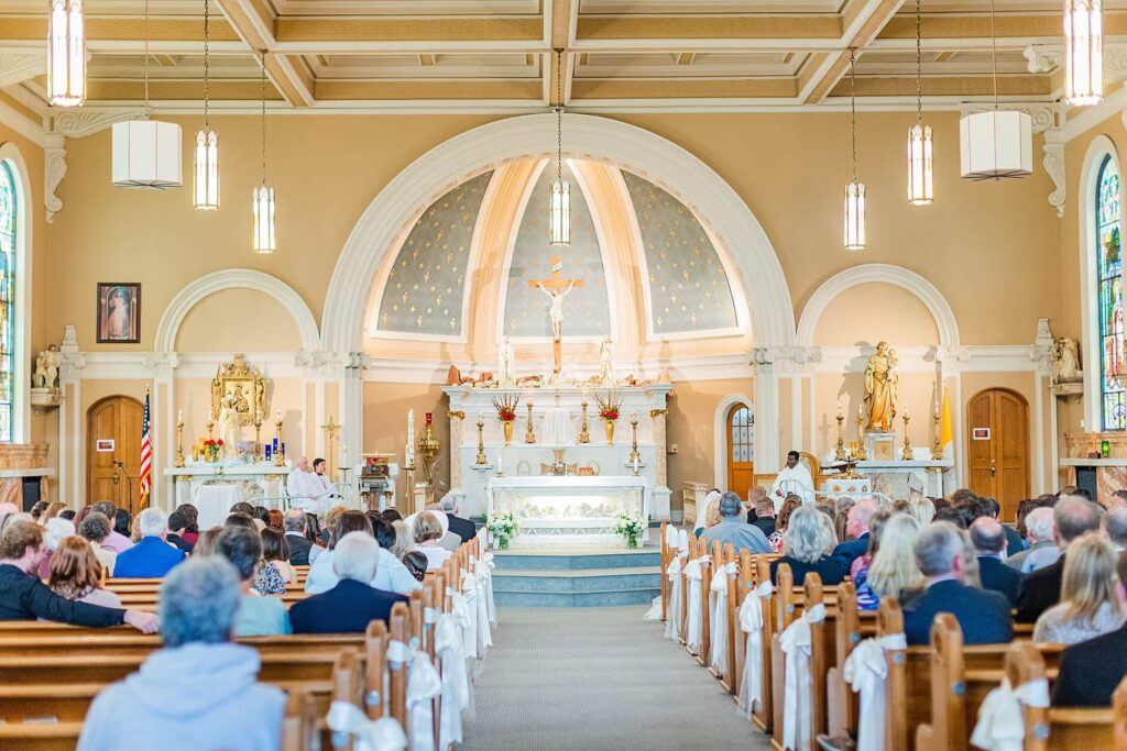A wedding at the Saint Thomas Church in Coeur d'Alene with the guests waiting for the bride and groom