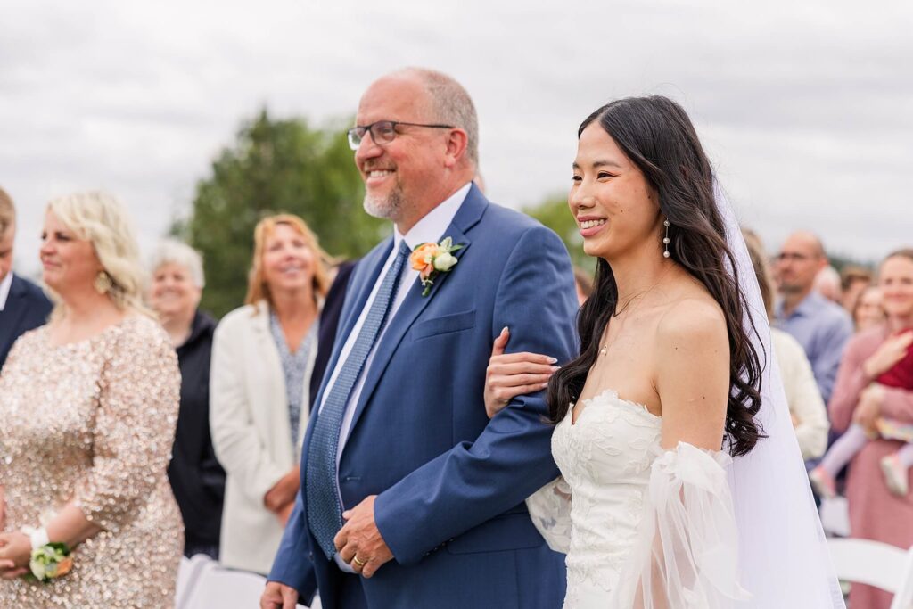 Bride walking down with her dad - Spokane Wedding Christ Centered Ceremony