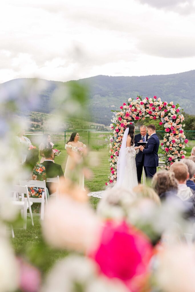 Spokane Wedding Ceremony View with colorful flowers