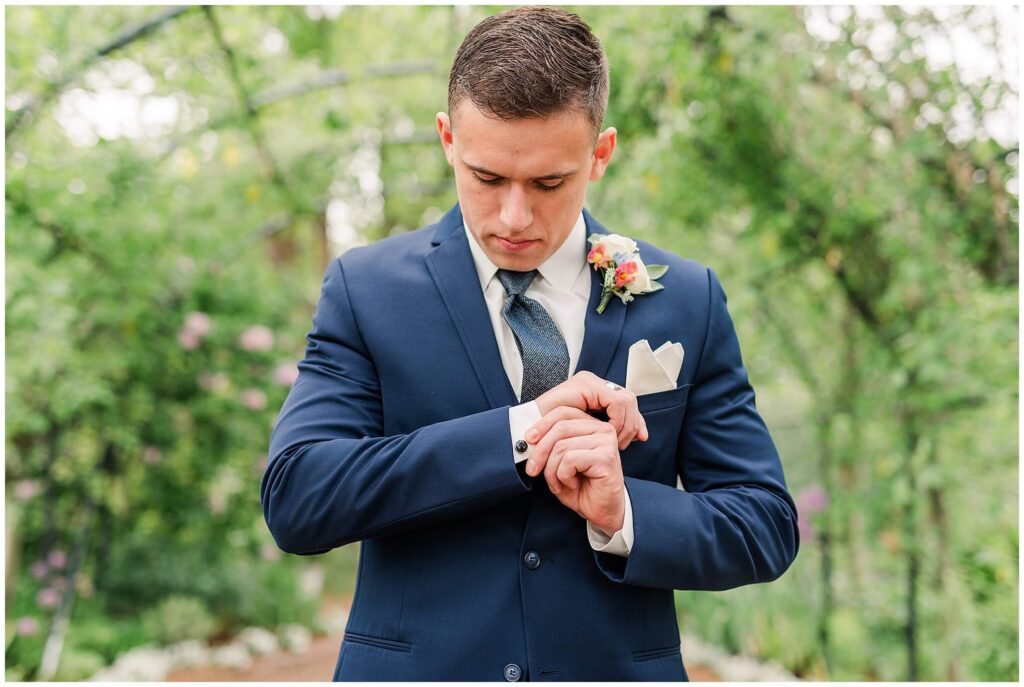 Portraits of the groom at Rosarium Garden Wedding Venue Spokane