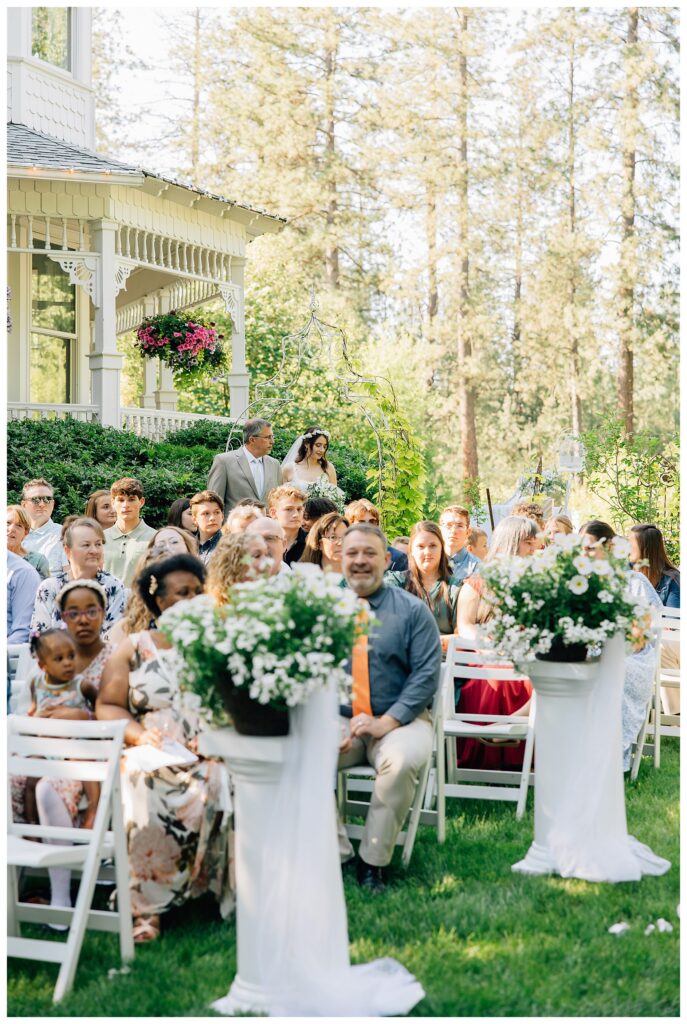Bride with her father walking down the aisle 